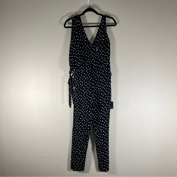 NEW LULUS XS JUMPSUIT BLACK WHITE POLKA DOT V NECK ASYMMETRICAL SLEEVE RETRO - Picture 9 of 15